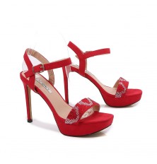 High heeled sandals studded...