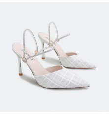 Patterned heeled chic...